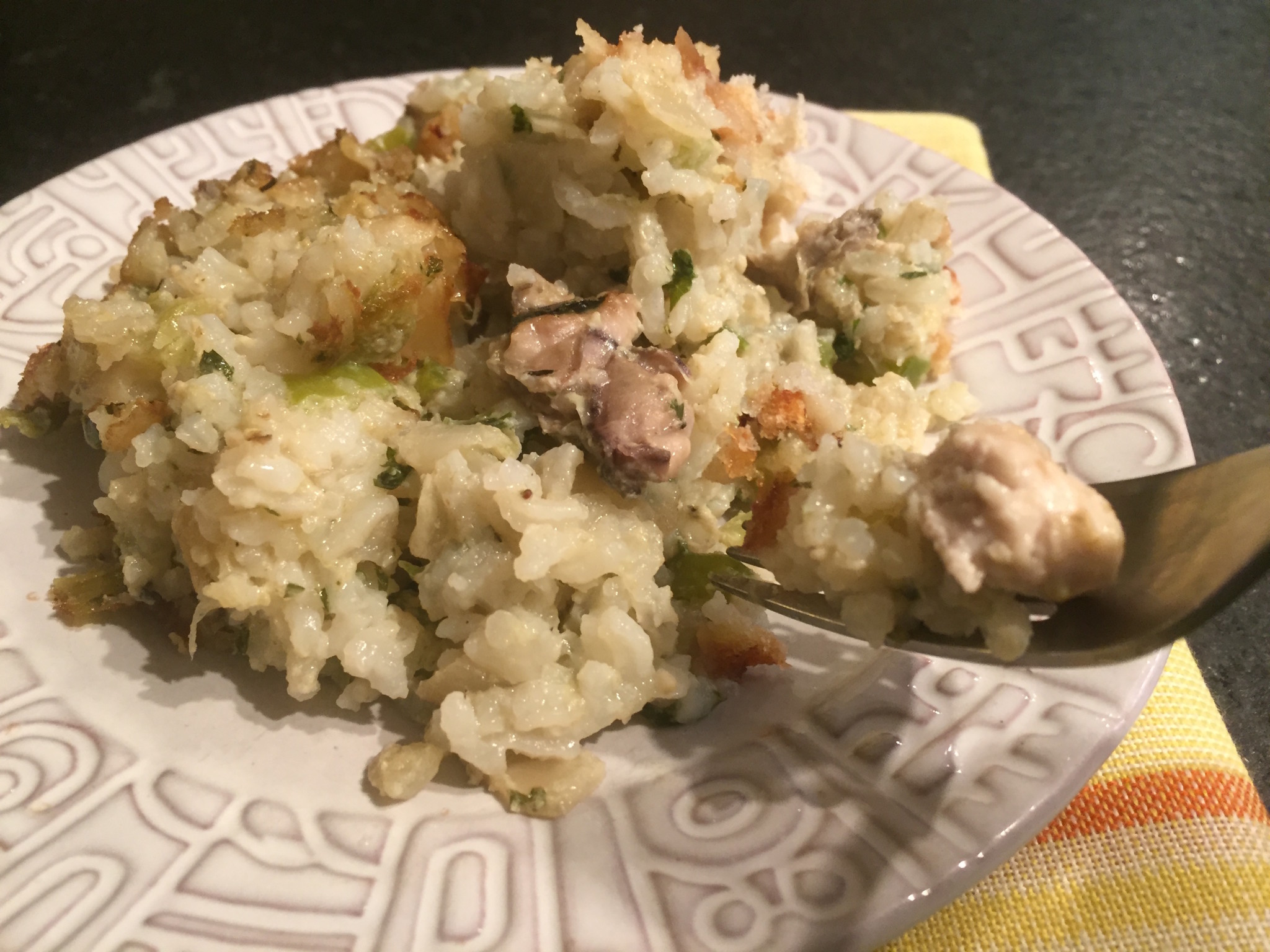 Serving of Craig Claiborne's oyster and rice dressing recipe from the New York Times (1987).