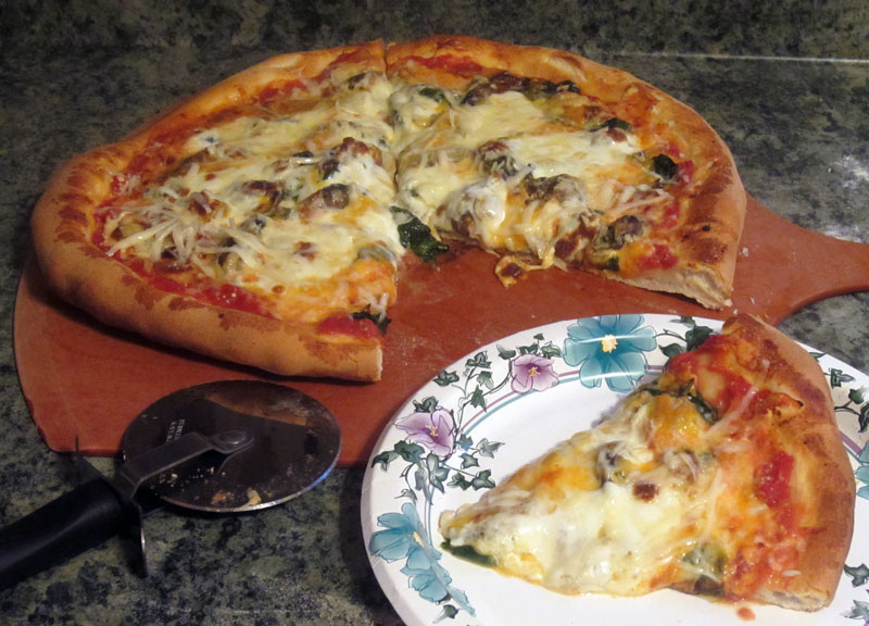 cheesy smoked oyster pizza