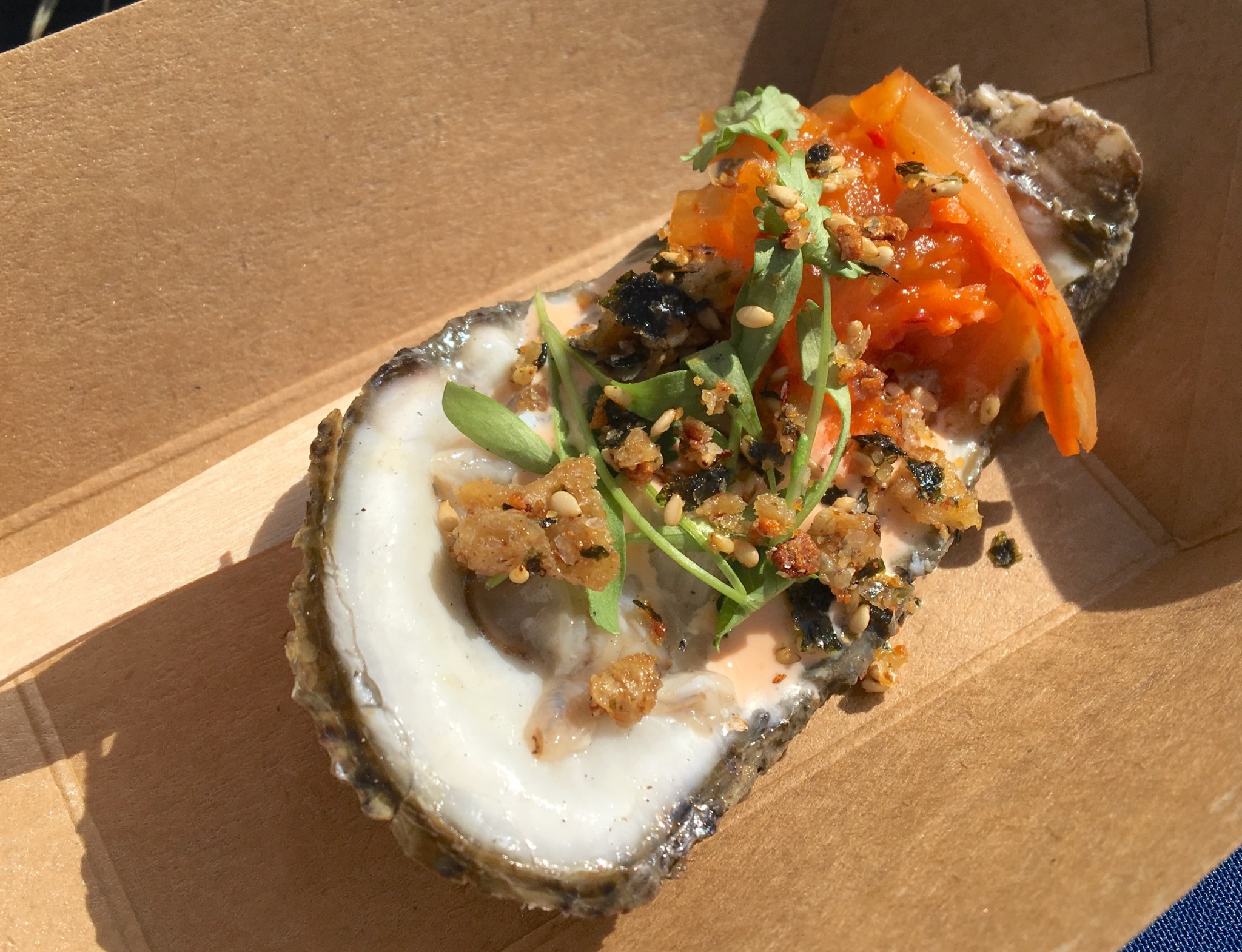 Alabama Oyster with Pumpkin Kimchi and Chicken Skin Furikake from Saltine.